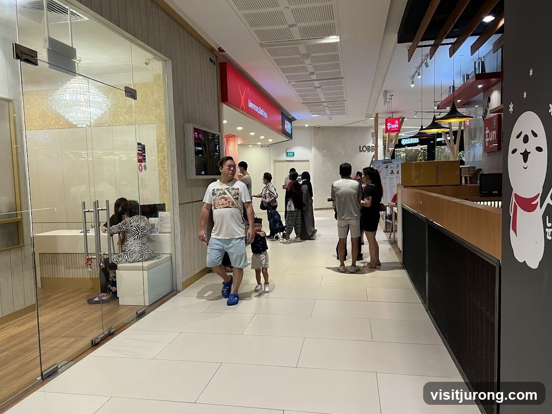 People walking in a mall corridor