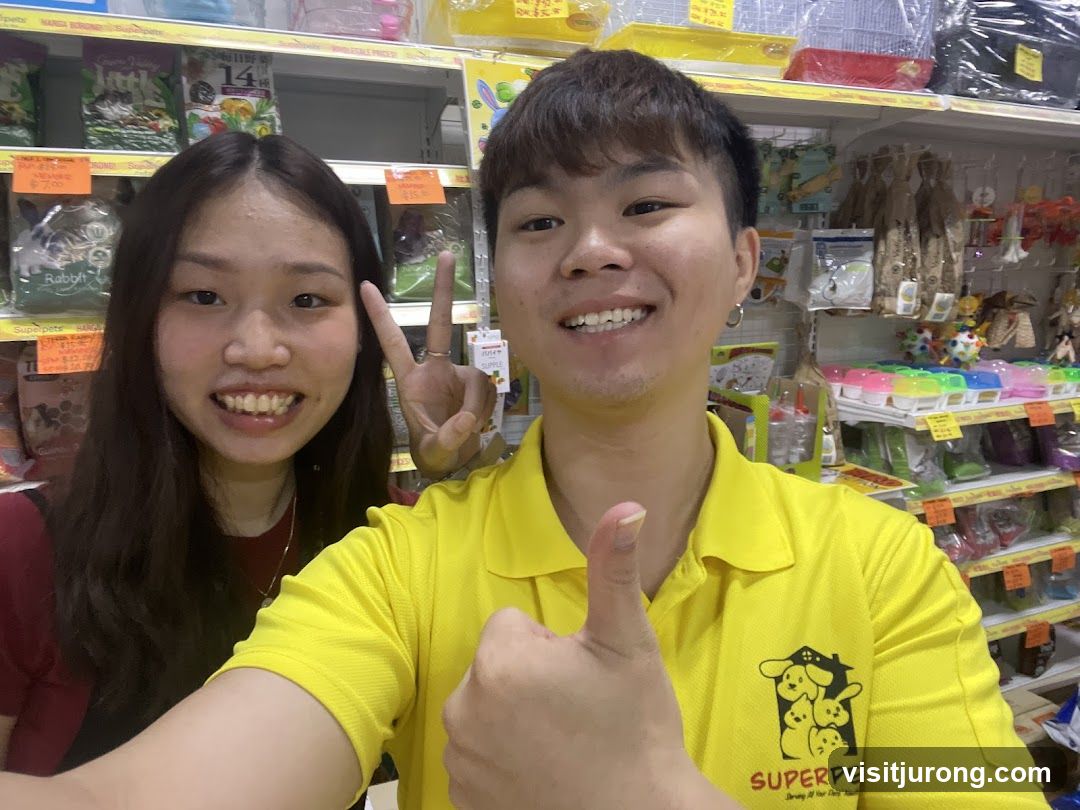 Two people in a pet store