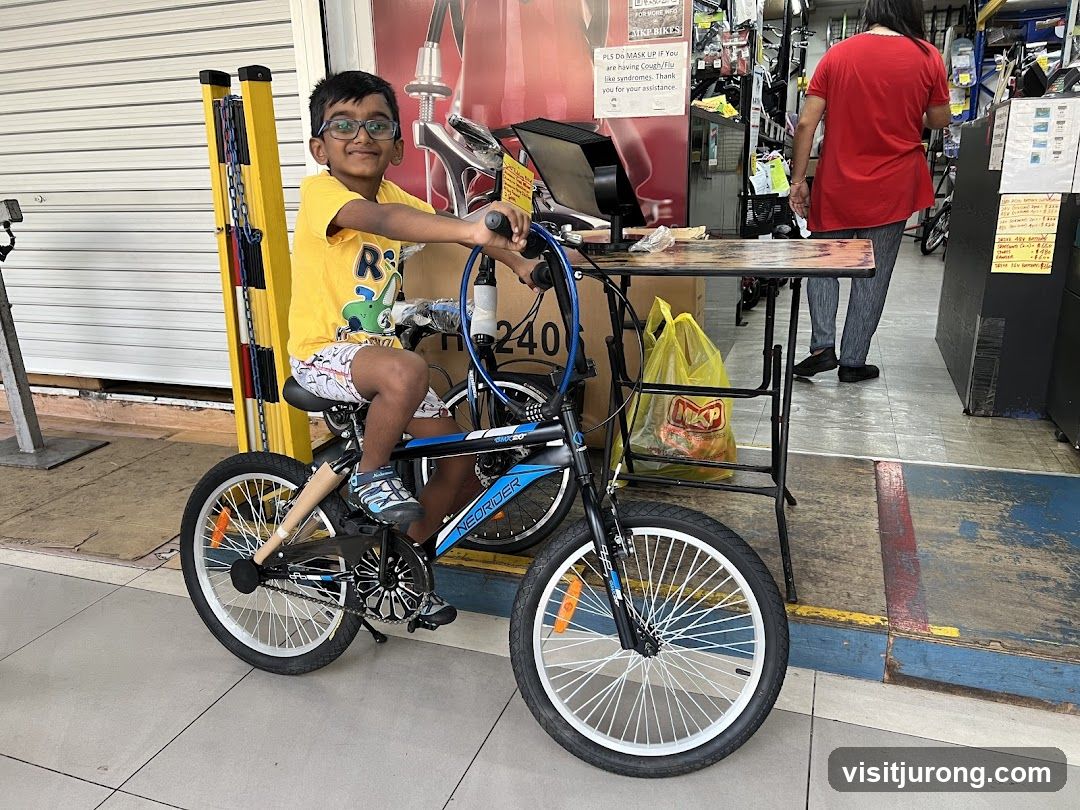Boy on a bicycle in a store