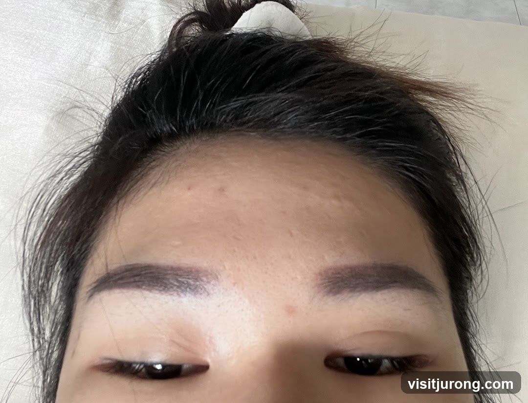 Close-up of a person's forehead and eyes