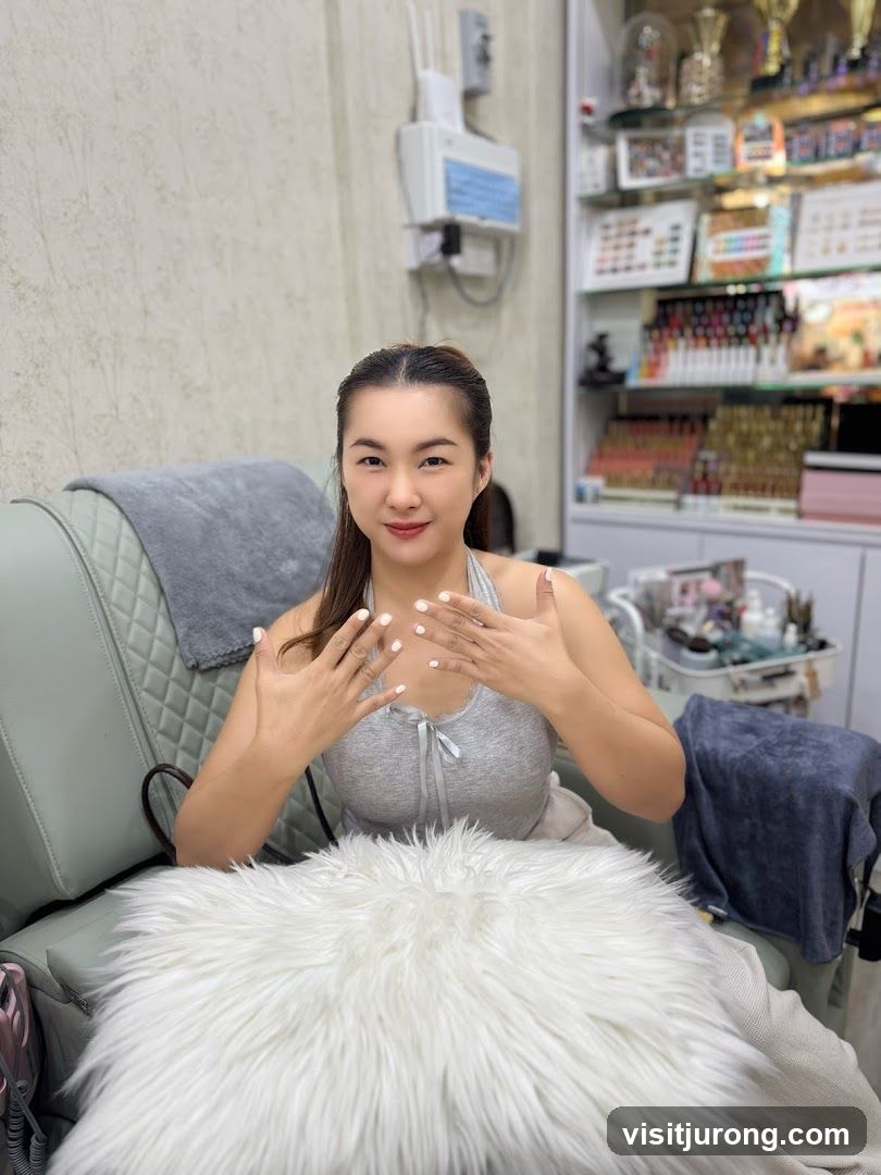 Woman Showing Off Freshly Painted Nails