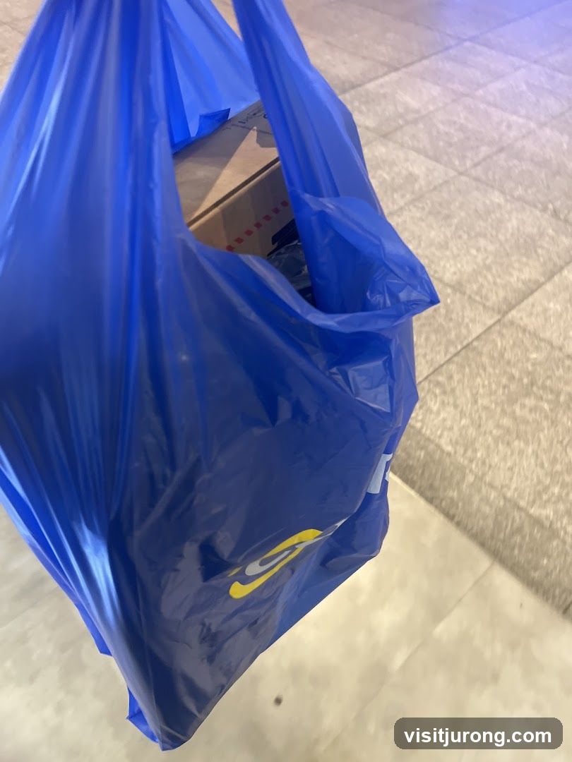 Blue shopping bag with logo