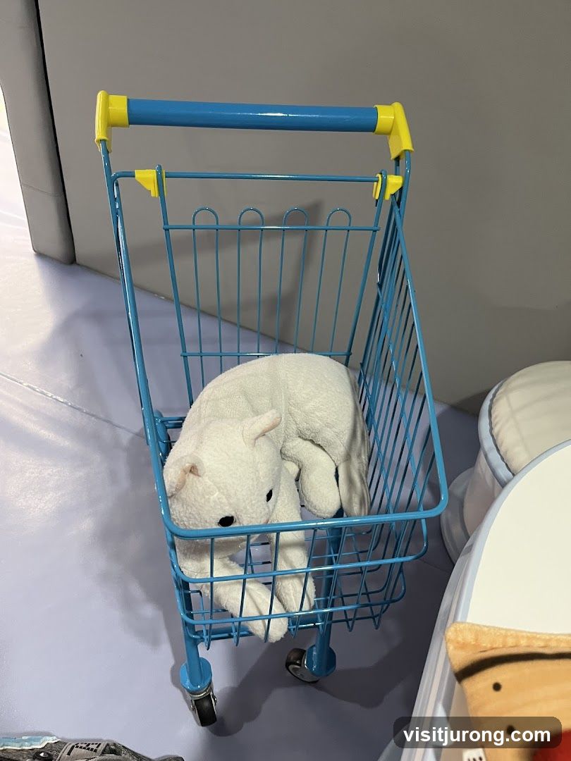 Plush Cat in Shopping Cart
