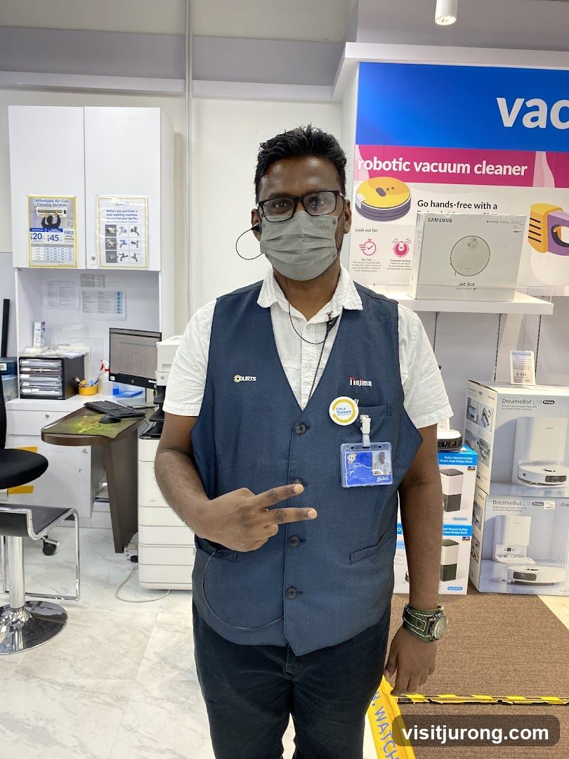 Sales Associate with Robotic Vacuum Cleaners