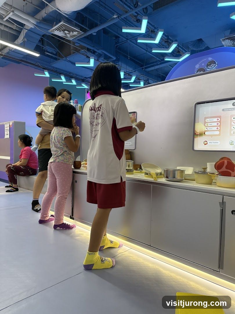 Children playing in a kitchen area
