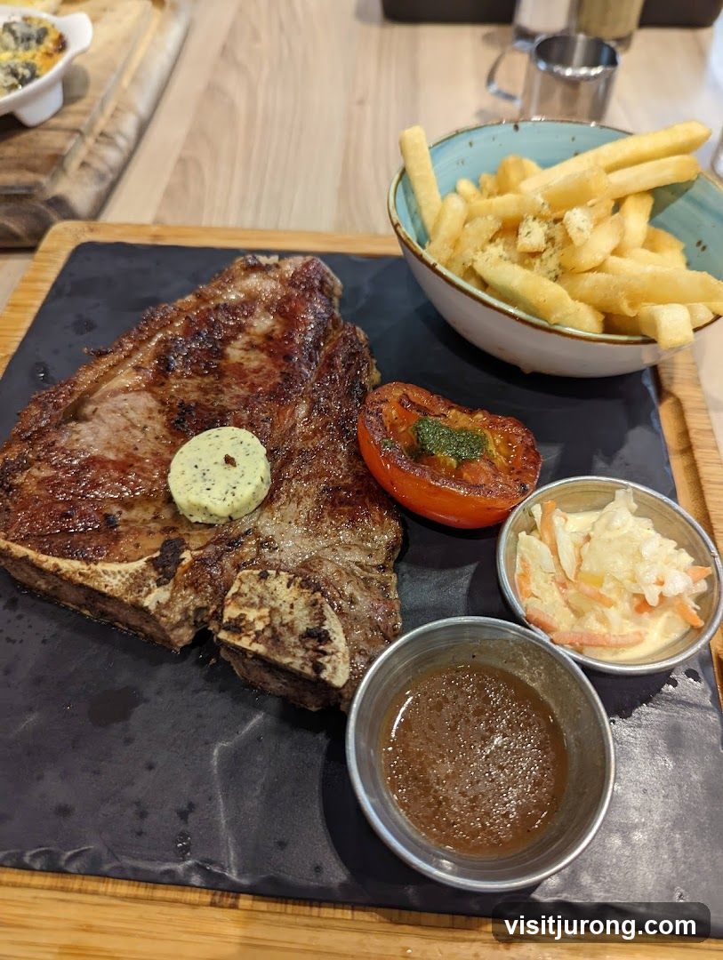 T-bone steak with fries and sides