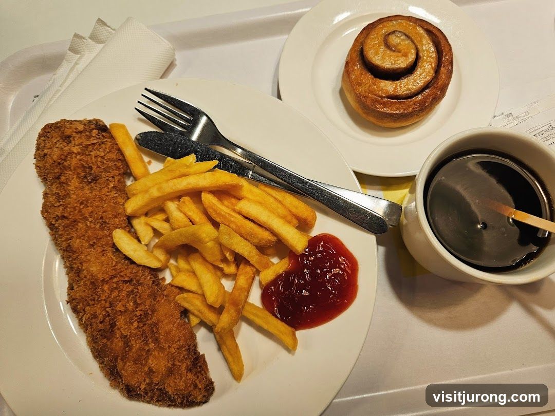 Fish and Chips with Cinnamon Roll and Coffee