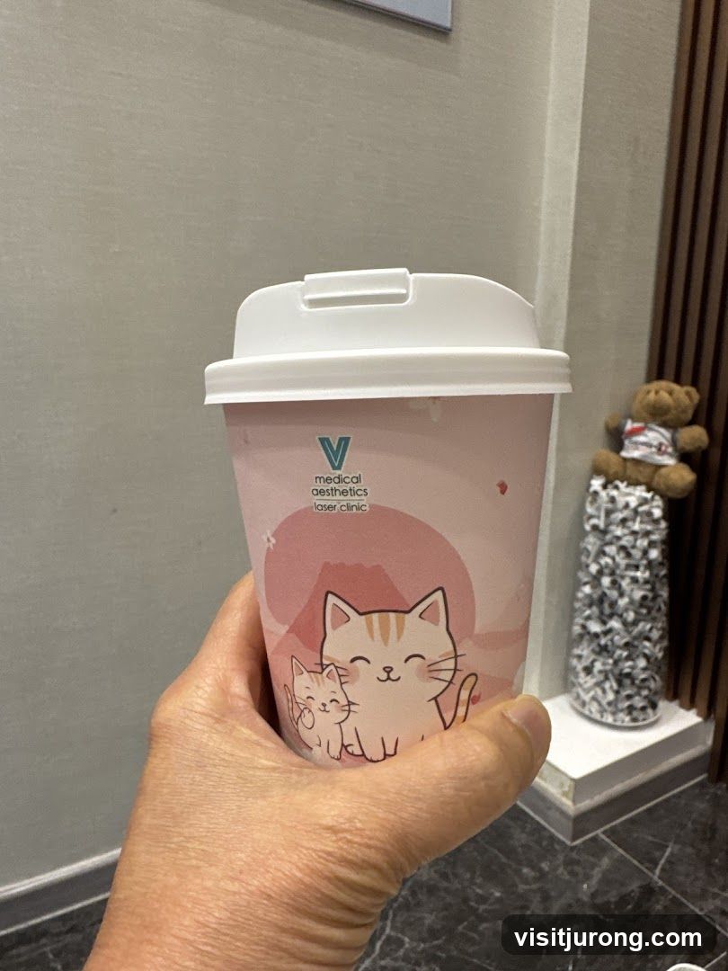 Coffee cup with cat design