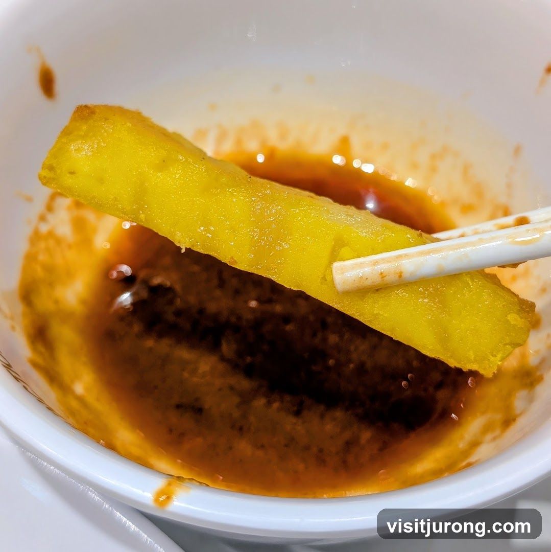 Fried Food Dipped in Sauce