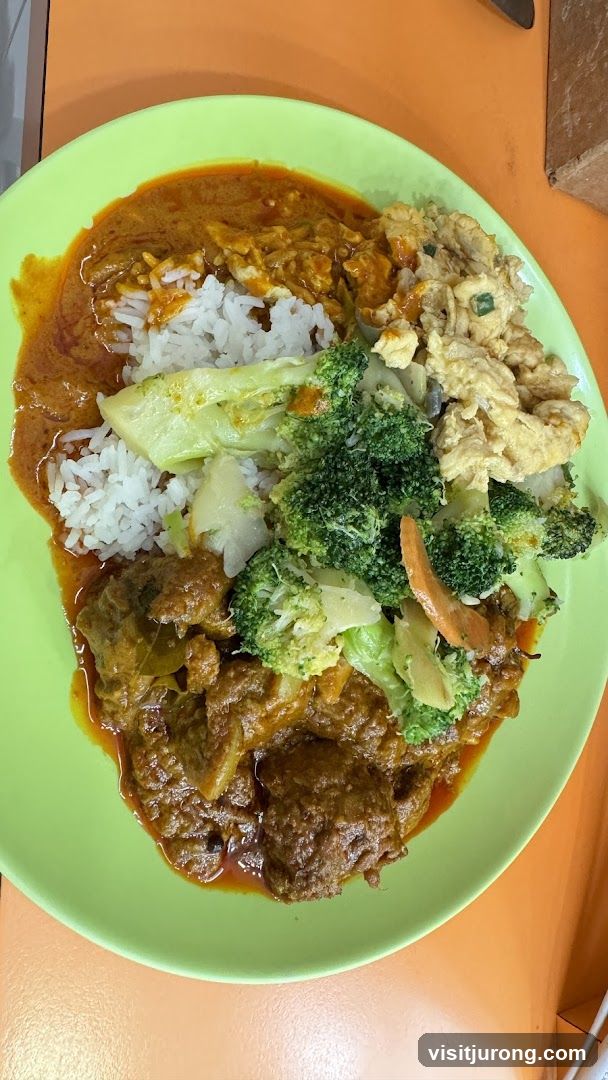 Plate of Rice with Curries and Vegetables