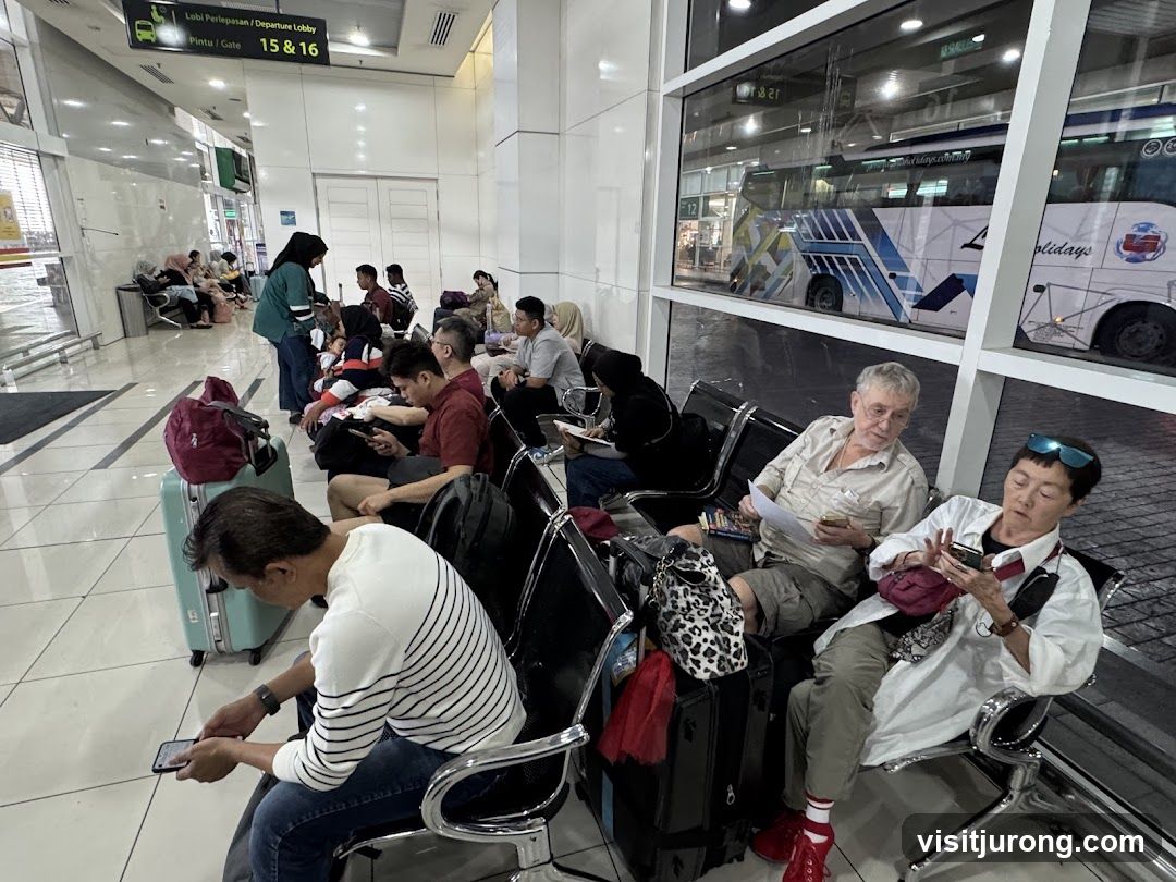 People waiting in a departure lobby