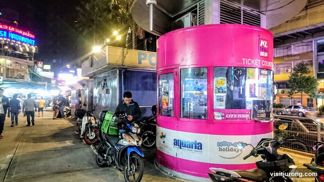 Night Market Scene with Ticket Booth