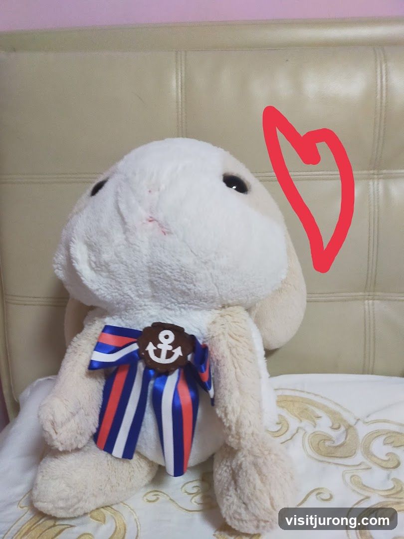 Plush toy with nautical ribbon
