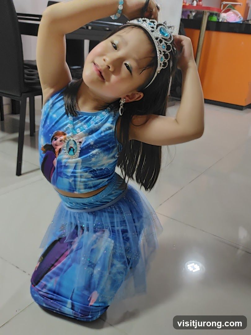 Girl in Frozen-themed costume