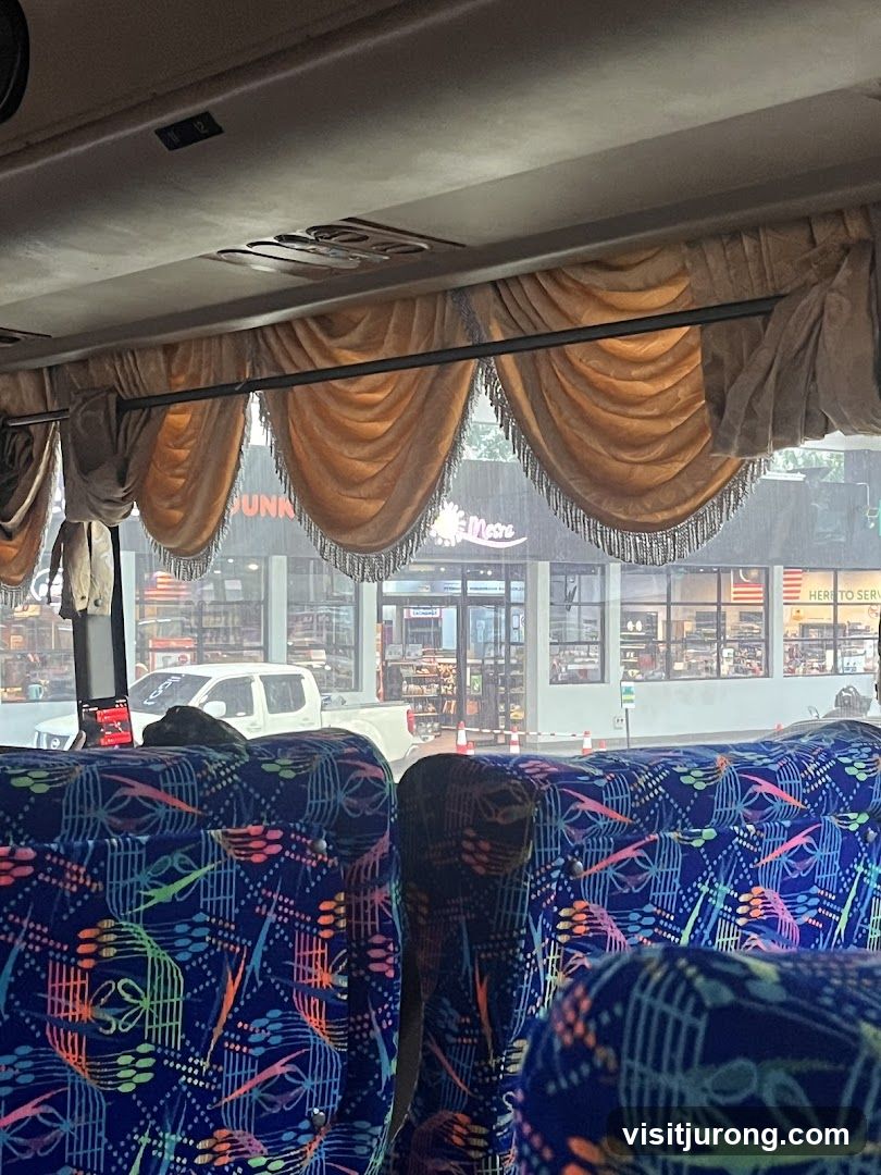View of a street through a bus window