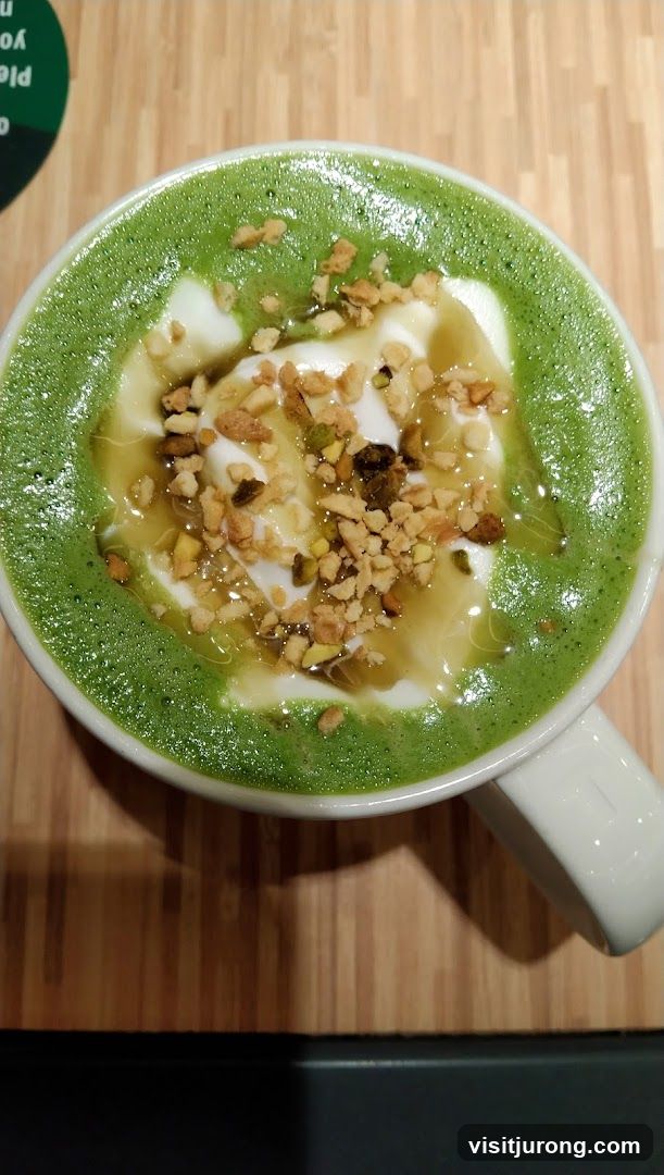Matcha Latte with Whipped Cream and Nuts