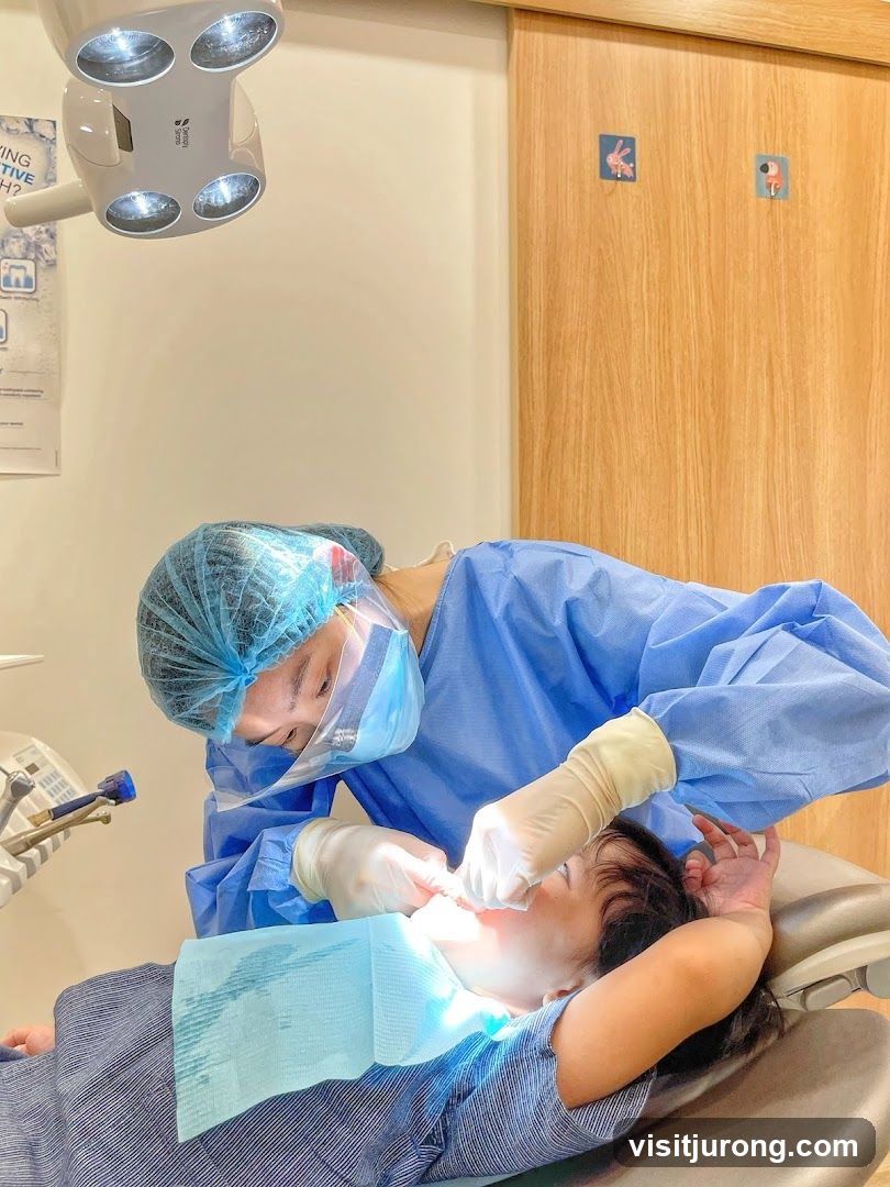 Dentist examining a child's teeth
