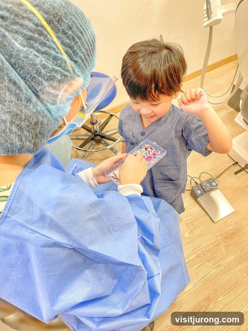 Dentist showing stickers to a child