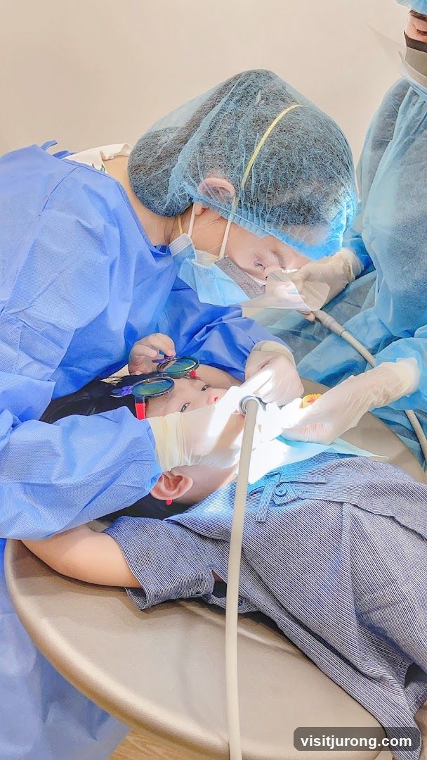 Dentist examining a child
