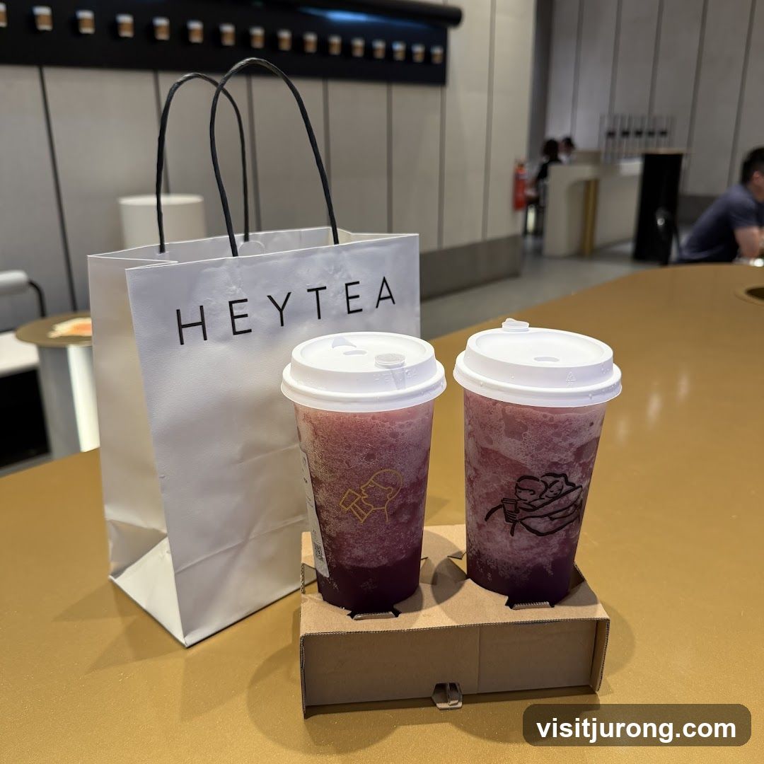 Two drinks and a shopping bag