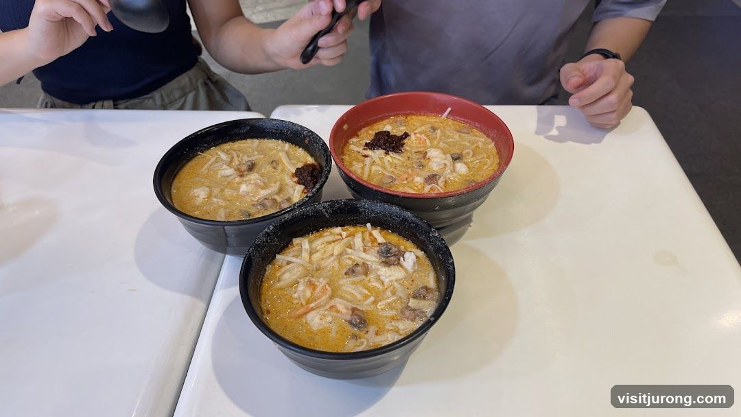 Three bowls of laksa