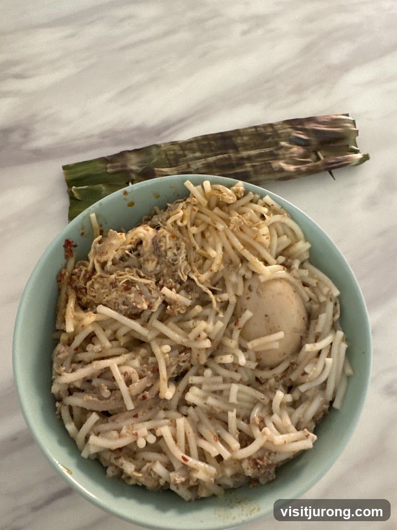 Noodle Dish with Egg and Leaf-Wrapped Item