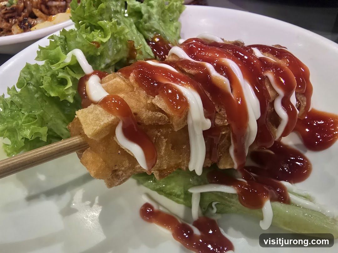 Corn Dog with Ketchup and Mayonnaise