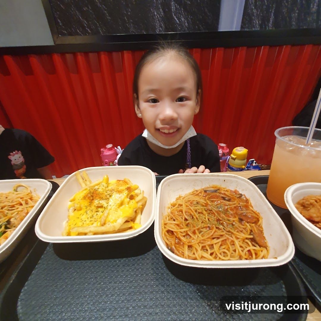 Girl with pasta and fries