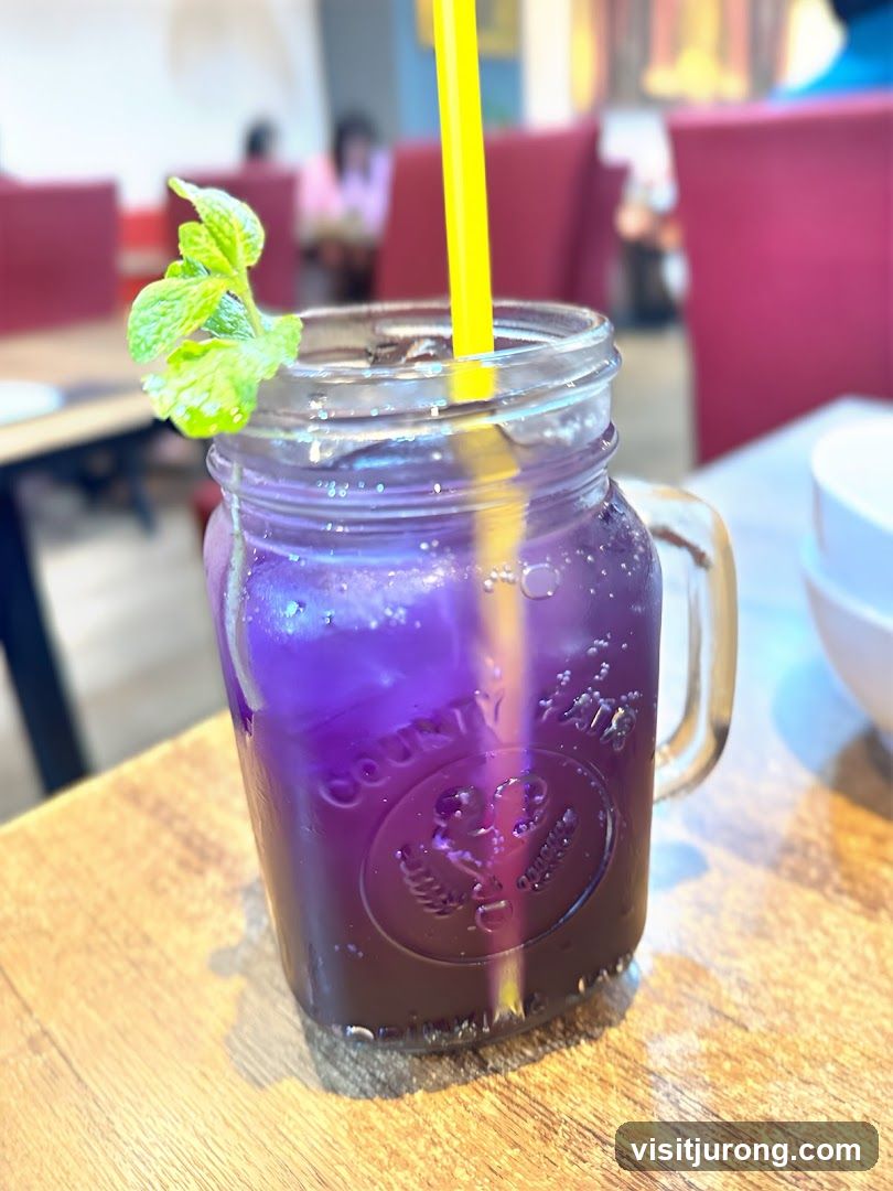Purple Drink with Mint Garnish