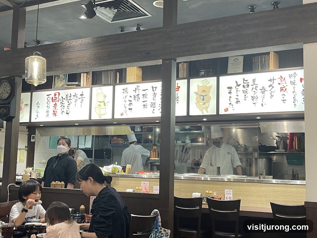 Restaurant Kitchen with Chefs and Menu Boards