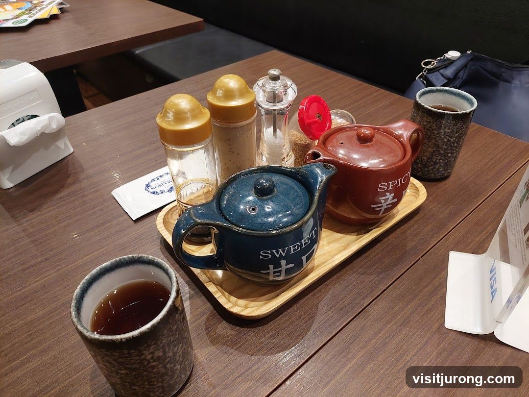 Table Setting with Teapots and Condiments