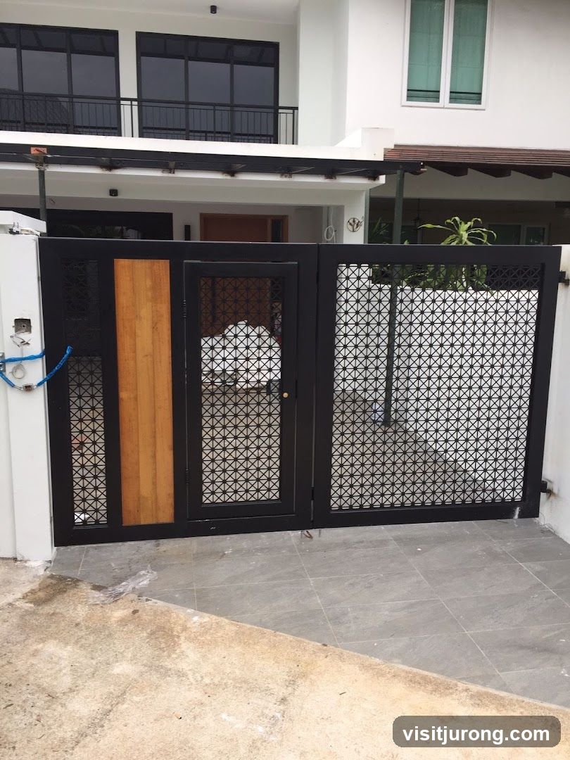 Modern Black Gate with Wood Accent