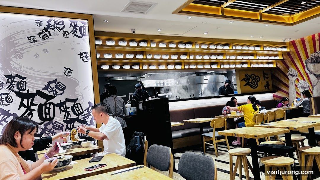 Restaurant Interior with Diners and Kitchen Staff