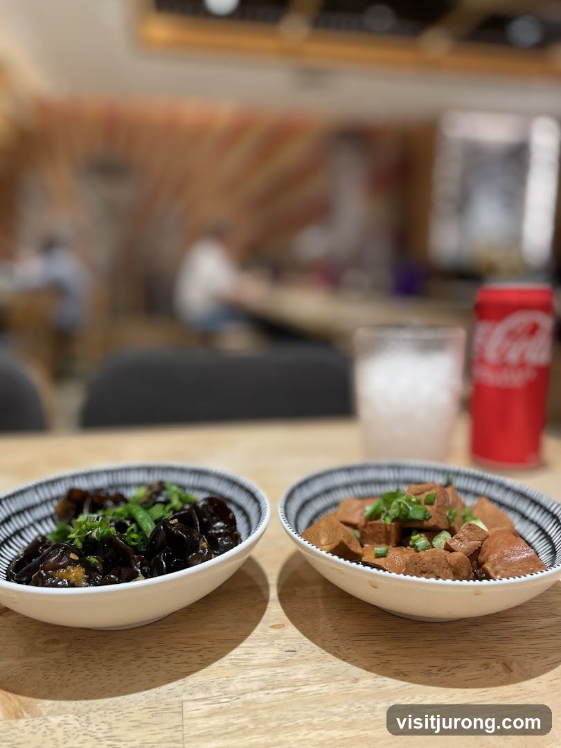 Two bowls of food with a can of Coca-Cola