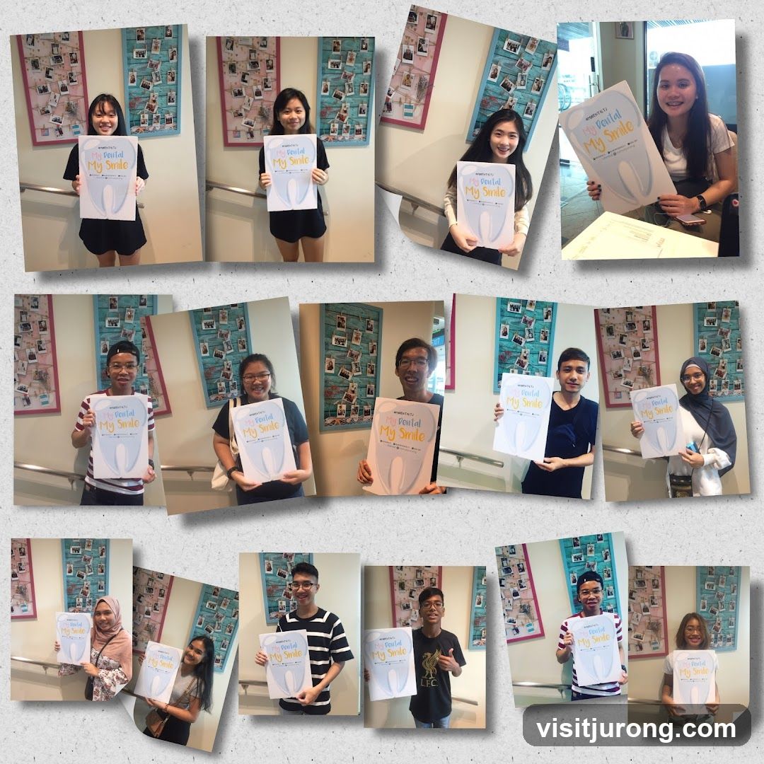 People holding dental posters