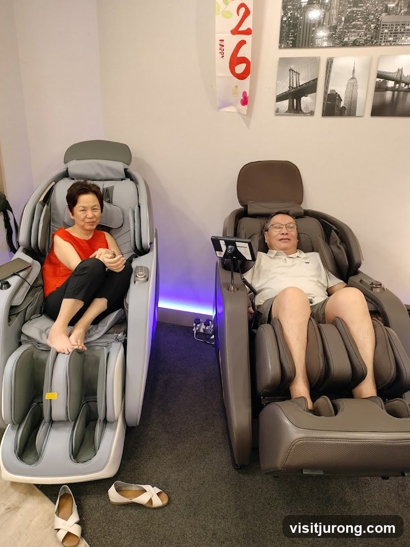 People relaxing in massage chairs