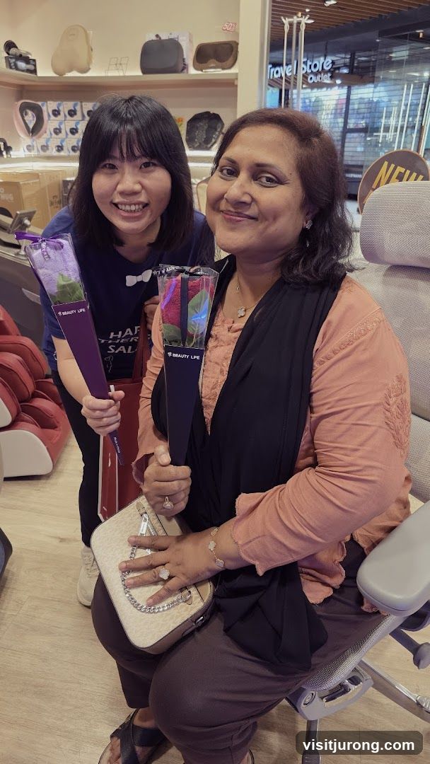 Two Women Holding Roses