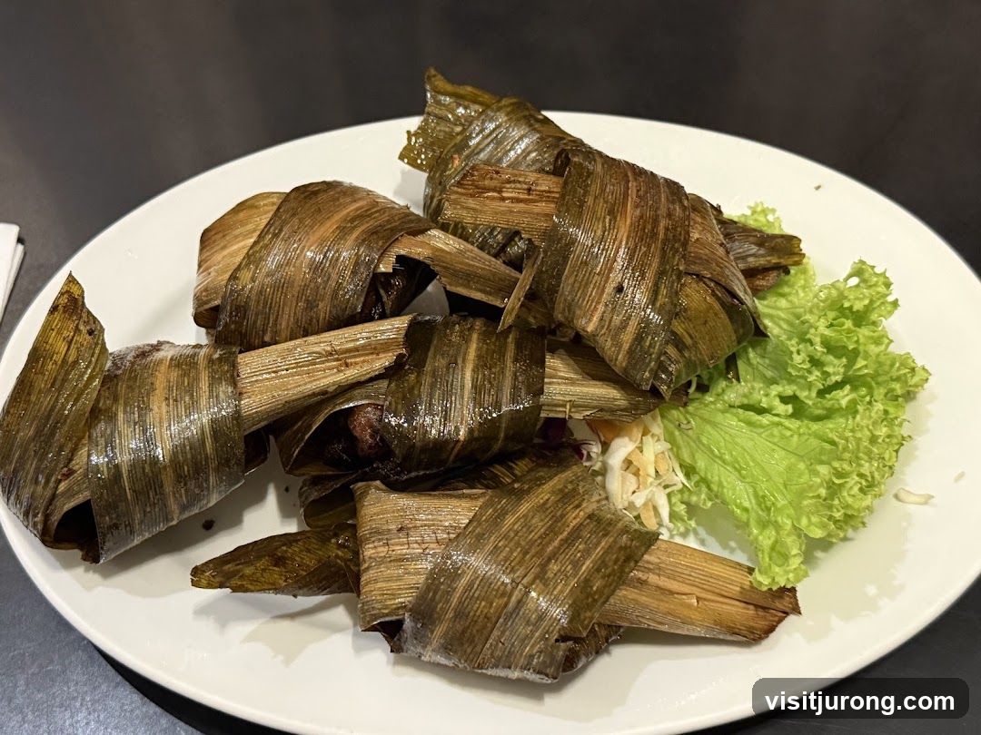 Chicken wrapped in pandan leaves