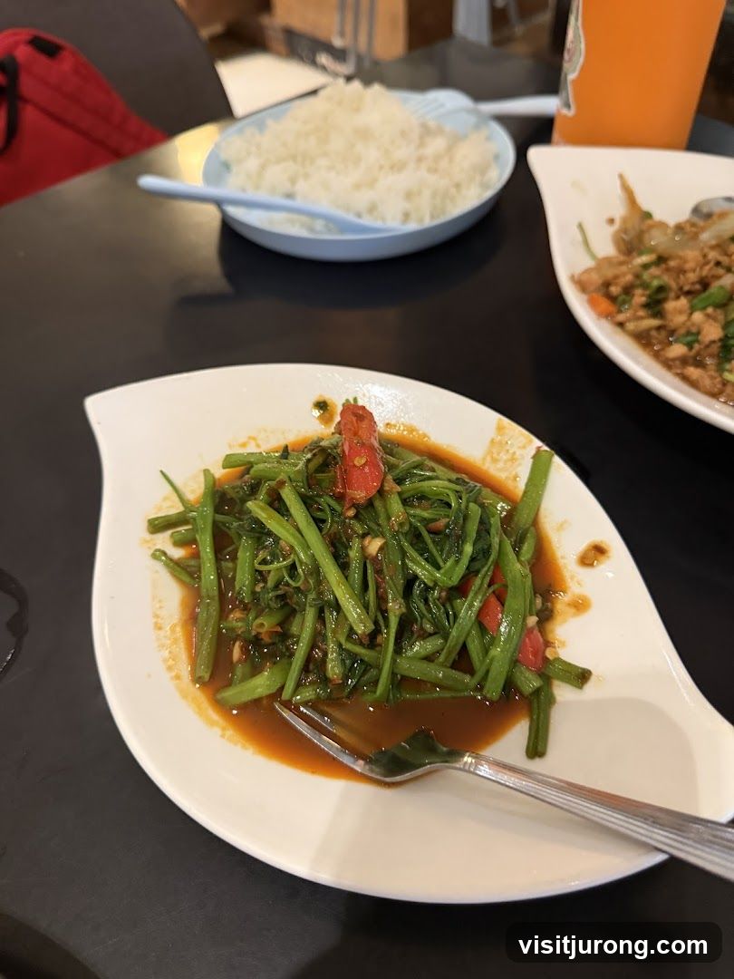 Stir-fried water spinach with rice