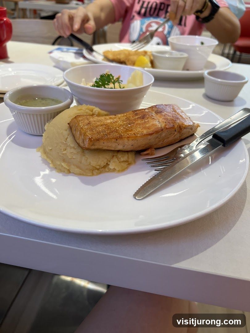 Salmon with mashed potatoes and coleslaw
