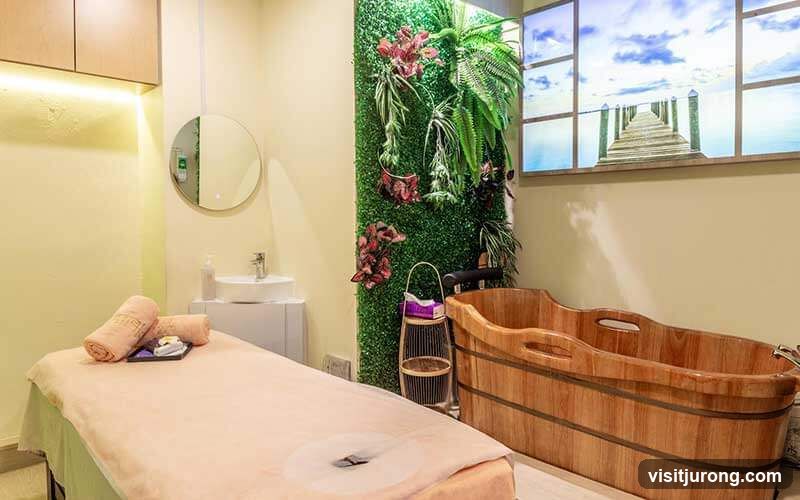 Spa Room with Massage Table and Wooden Tub