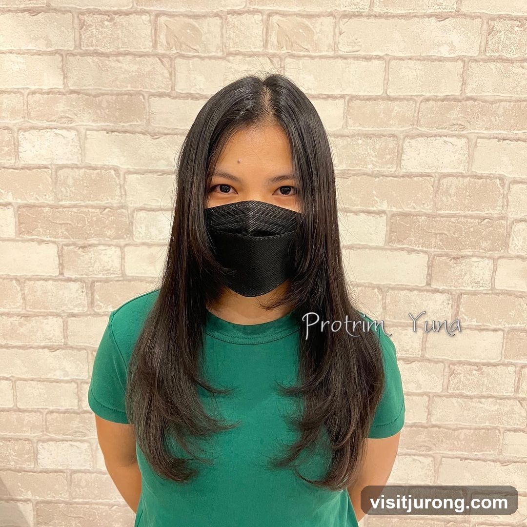 Woman with long layered hair