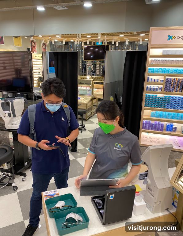 Optician assisting customer