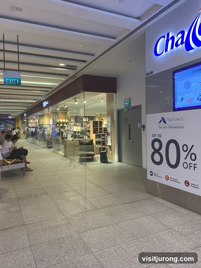 Mall corridor with shops and advertisements