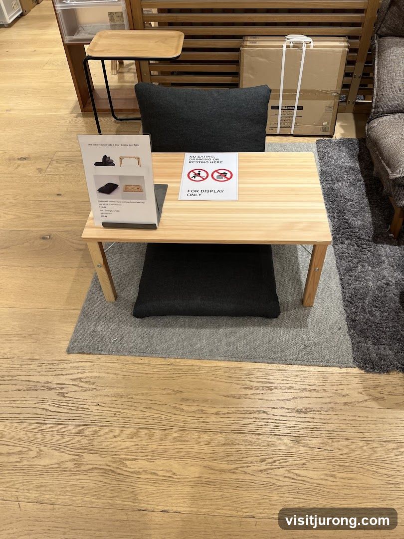 Display table with cushions and sign