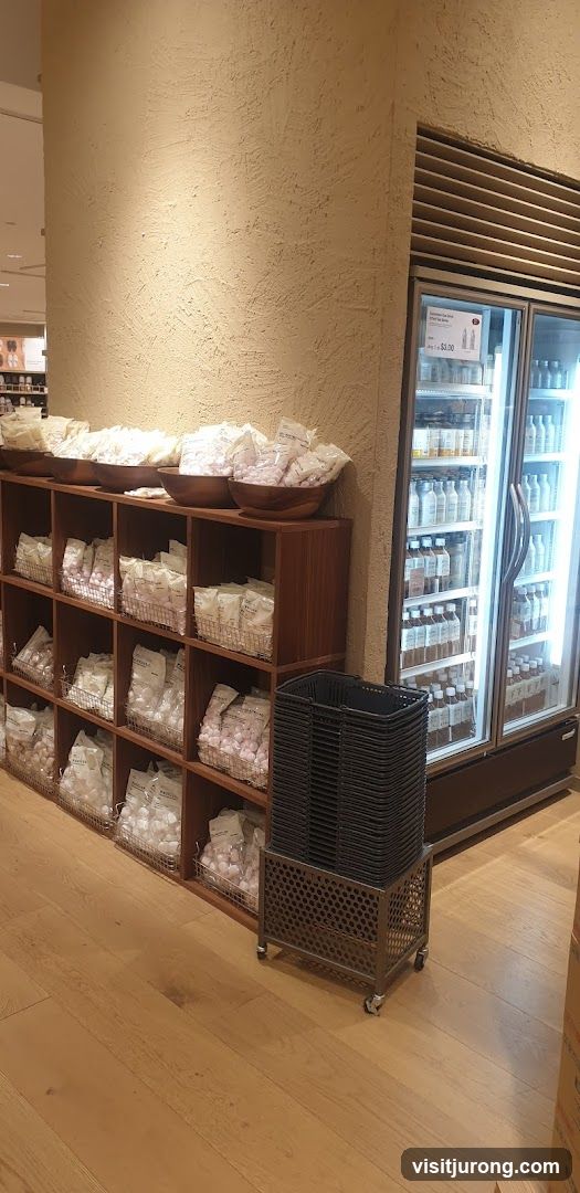 Store Display with Packaged Goods and Refrigerator