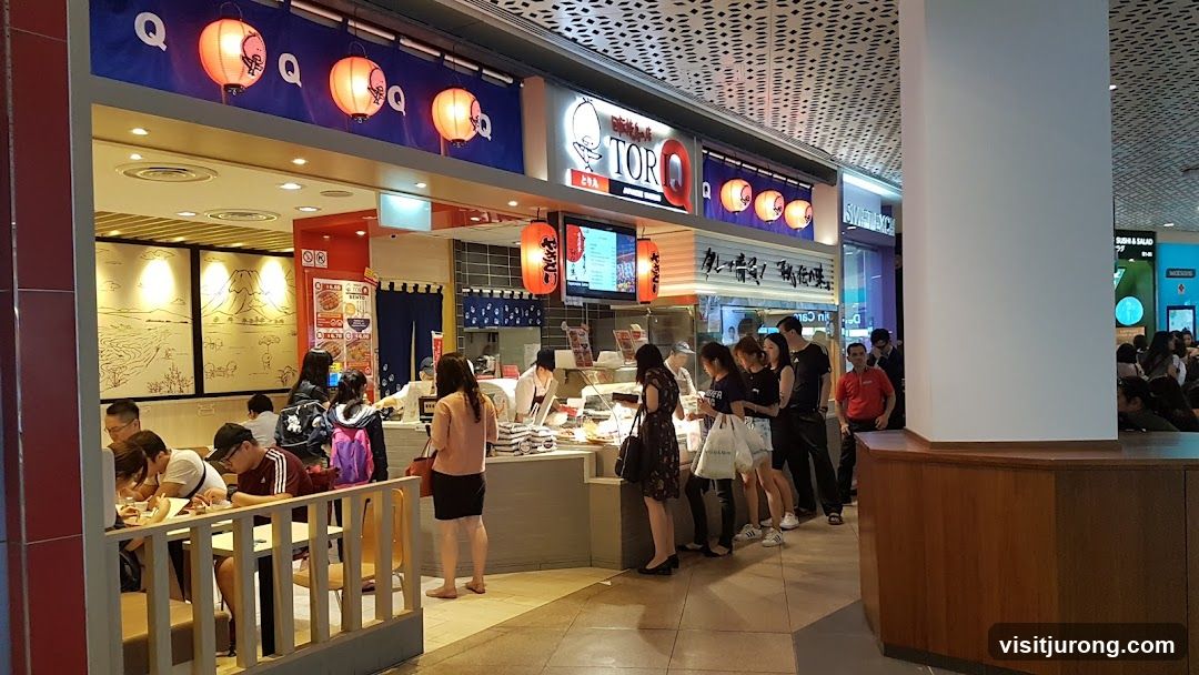 Japanese food stall with a queue