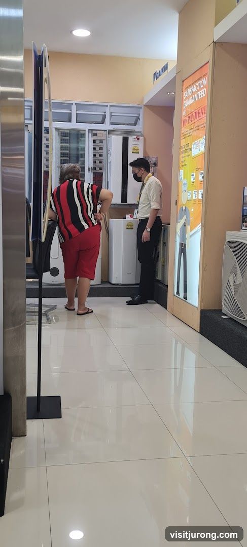 Salesperson assisting customer