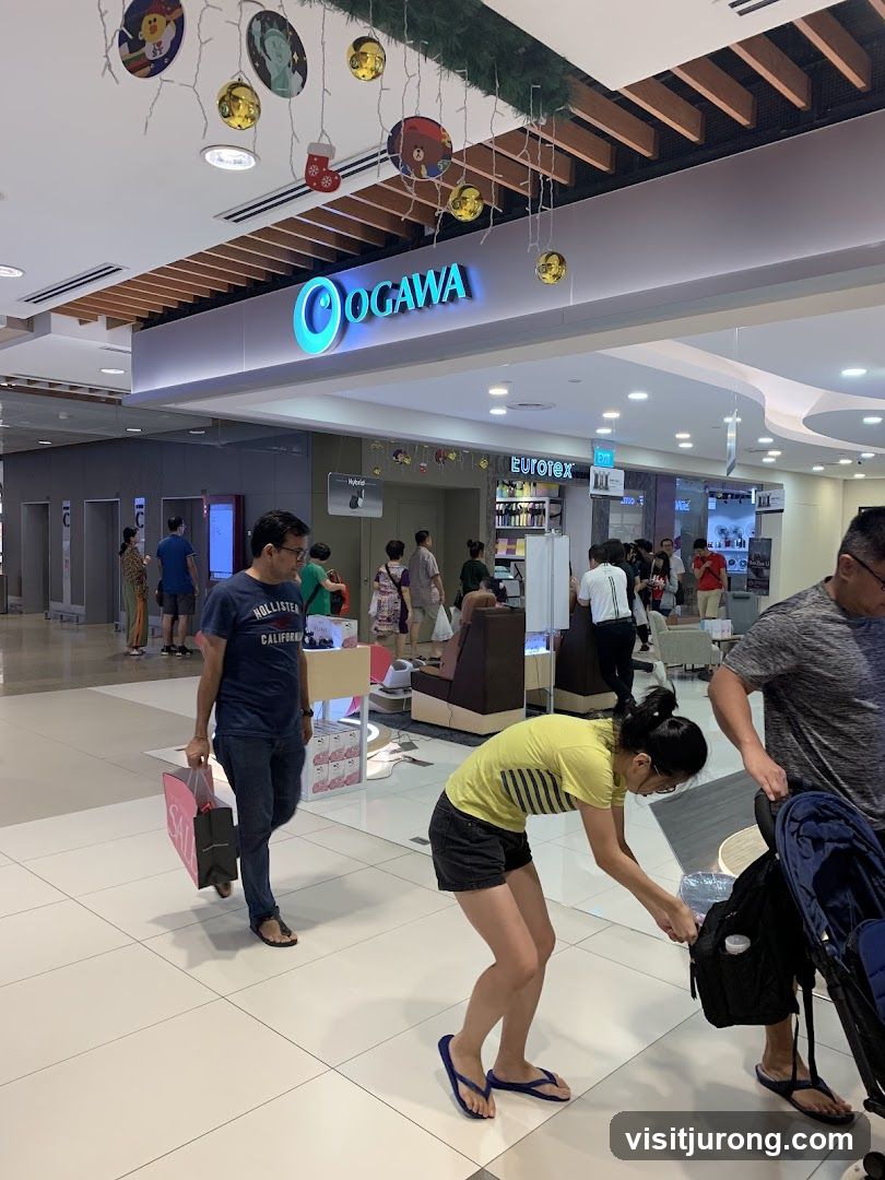 Interior of a shopping mall with OGAWA store