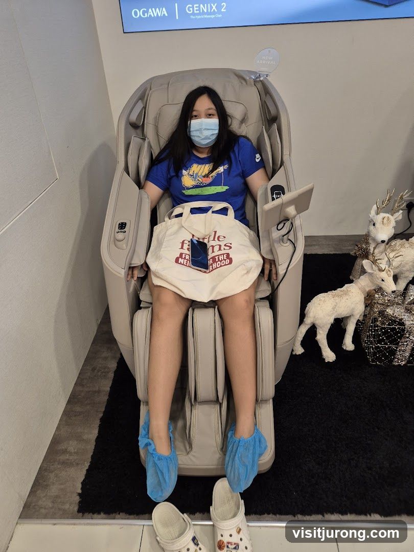 Woman trying out a massage chair